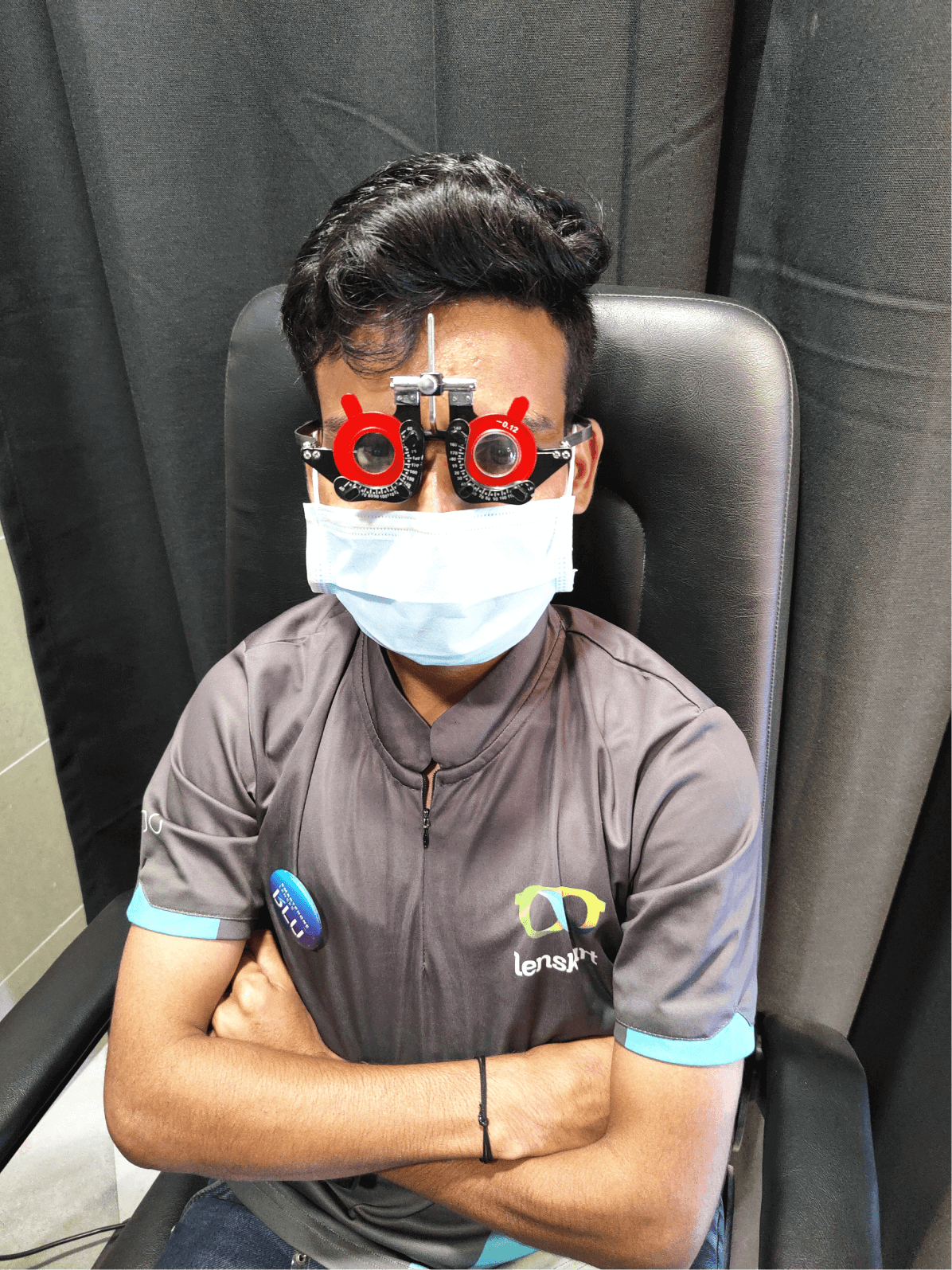 An optometrist in a Lenskart store's clinic